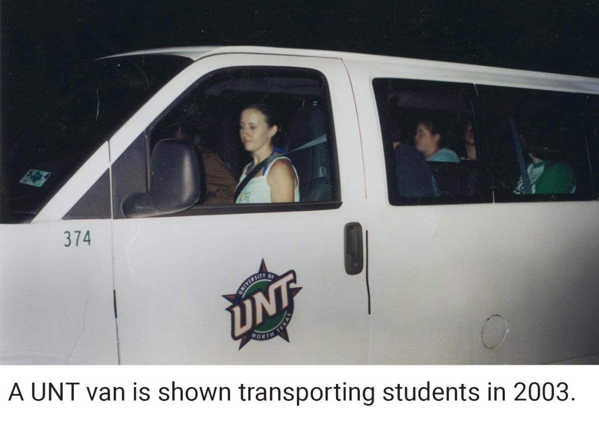 A UNT van is shown transporting students in 2003. 